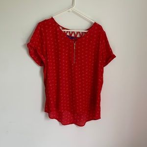 Red blouse with white circles